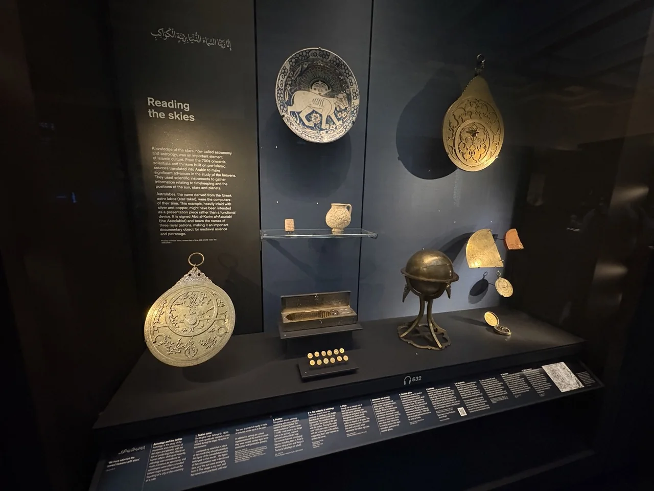 Museum display of historic Islamic astronomical instruments titled Reading the skies
