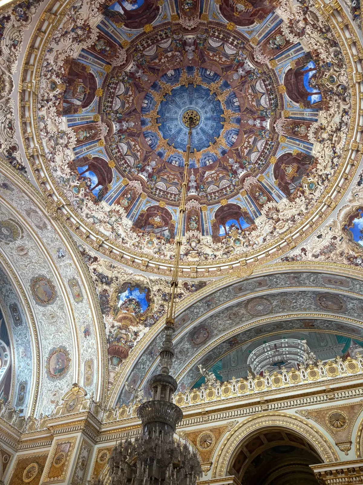 Ornate Ottoman palace dome with blue, gold, and painted details