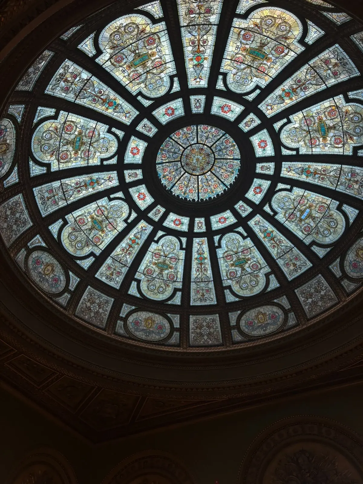 Circular stained-glass dome arranged in radial patterns