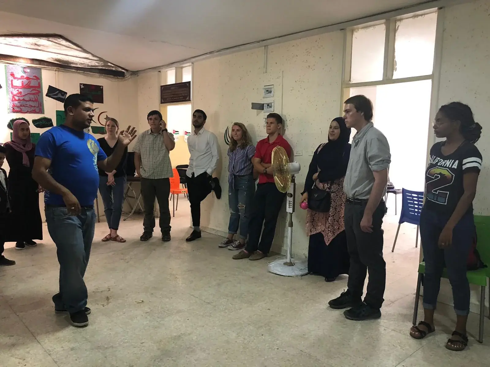 A classroom group listening during an English lesson in Jerash refugee camp